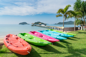 Colorful kayaks on the tropical beach in Phuket, Thailand. Summer, Vacation and Travel concept.