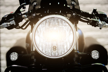 Close up Headlight of modern motorcycle in night..