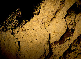 Stalactites and stalagmites inside natural limestone cave. Natural formations.