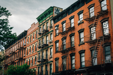 Fototapeta na wymiar Brick residential buildings in Greenwich Village, Manhattan, New York City.
