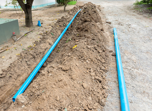 Water pipes laying construction site on ground