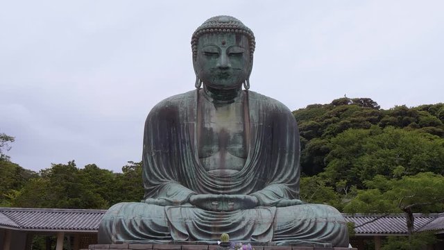 World famous Daibutsu Buddha - the Great Buddha Statue in Kamakura - TOKYO / JAPAN - JUNE 12, 2018