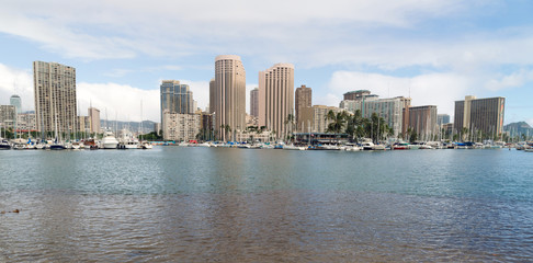 Fototapeta na wymiar Kahanamoko Lagoon Honolulu with slip full of Sail and Motor Boats