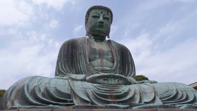 World famous Daibutsu Buddha - the Great Buddha Statue in Kamakura - TOKYO / JAPAN - JUNE 12, 2018