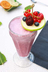 smoothie of blueberries and red currants on the table