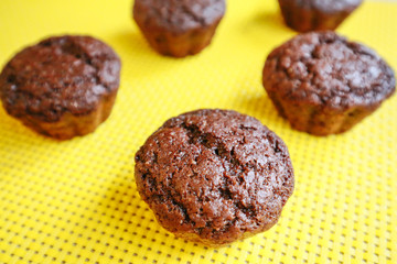 chocolate cakes on a yellow napkin