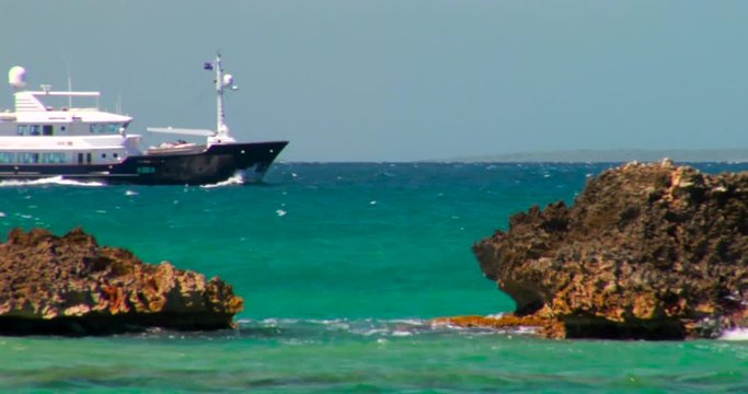 Boat passes between two rocks