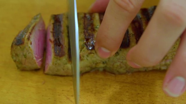 Cooking piece of veal steak on the electric grill