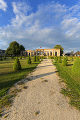 Ruins of 18th century classical palace, manor complex at sunset, situated on the Nida River near Jedrzejow, Sobkow, Poland