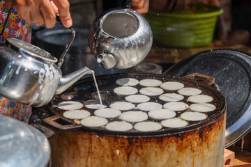 Making of Thai sweetmeat khanomkhrok