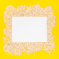 Top view of oatmeal flakes in minimal style