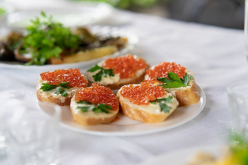 Sandwiches with red caviar