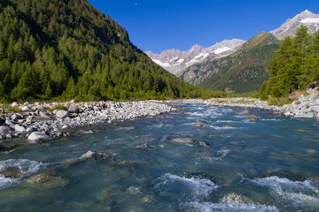 Naklejka na ściany i meble Mountain river, alpine valley