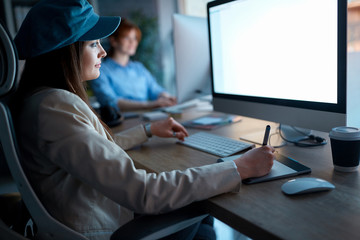 Smiling woman entrepreneur freelancer working overtime.