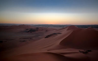 Fototapeta na wymiar Sunrise view to Tin Merzouga dune, Tassili nAjjer national park, Algeria