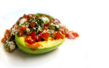 Stuffed avocado with copy space
