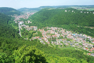 Fototapeta na wymiar Top view of the german village Honau and mountains. View from the castle Liechtenstein. Baden-Wuerttemberg, Germany.
