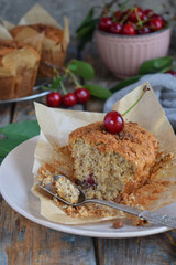 Muffin from flax seeds, millet and rice flour with cherries. Gluten-free cake. Healthy pastries. Rustic photo. Copy space