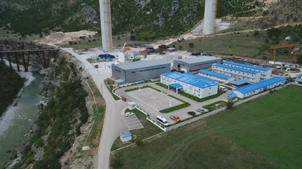 Drone shot of office and temporary homes of Chinese workers at large infrastructure project in Montenegro, development and political influence in Europe