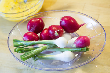 Fresh washed vegetables on wooden kitchen table