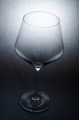 wine glass on a dark background