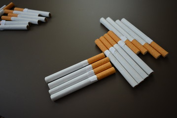 Nicely laid out a lot of cigarettes on the table