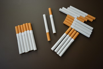 Nicely laid out a lot of cigarettes on the table