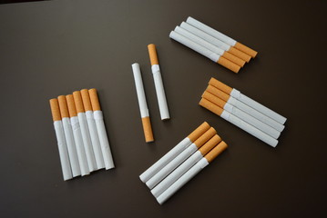 Nicely laid out a lot of cigarettes on the table