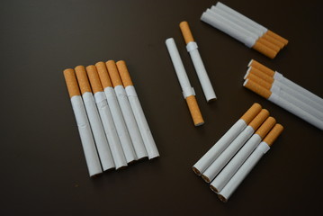 Nicely laid out a lot of cigarettes on the table