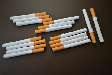 Nicely laid out a lot of cigarettes on the table