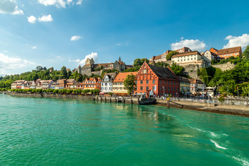 Meersburg, town in the German state of Baden-Wurttemberg on the shore of Lake Constance (Bodensee), famous for a Medieval Meersburg Castle. As seen from a ferry to Konstanz - obrazy, fototapety, plakaty