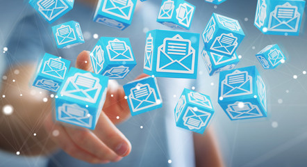 Businessman using floating cube emails 3D rendering