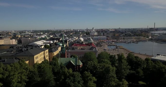 4K summer day aerial video of Helsinki Kaivopuisto central park with Observatory, ctyscape view, park woods area around it, in capital of Finland Suomi, northern Europe