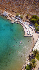 Aerial birds eye view photo taken by drone of famous tropical beach of Agia Marina, Symi island, Dodecanese, Greece