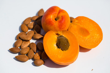 Apricot kernels together with fresh apricot