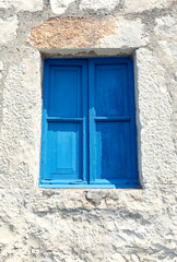 Fototapeta na wymiar Old blue house window background