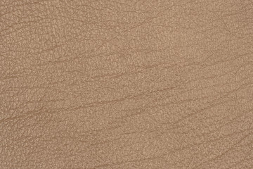 Light brown leather texture surface. Close-up of natural grain cow leather Light brown leather texture surface.