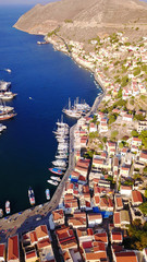 Aerial brid's eye photo taken by drone of Yalos, iconic port of Symi island, Dodecanese, Greece