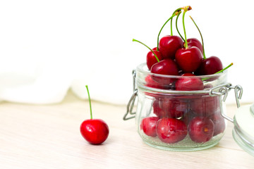fresh cherries in jar for Homemade preserved cherry jam, preserves for winter - sweet eating, dessert and food concept
