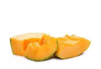 Fresh cantaloupe melon slices isolated on white background