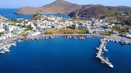Fototapeta na wymiar Aerial birds eye view photo taken by drone of picturesque port of Patmos island called Skala, Dodecanese, Greece