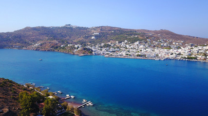 Naklejka na ściany i meble Aerial birds eye view photo taken by drone of picturesque port of Patmos island called Skala, Dodecanese, Greece