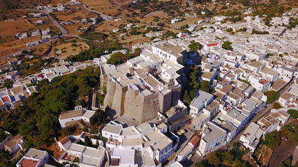 Fototapeta premium Aerial bird's eye view photo taken by drone of Massive fortified stone Monastery of Saint John the Apostle, Patmos island, Greece