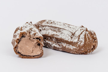Two eclairs on a white background