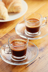 Cups of Espresso on old wooden table