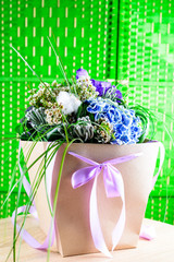 Beautiful gift box with bloom fresh blue and purple flowers pn g