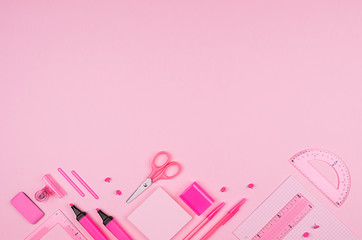 Pink office stationery collection on soft pastel pink paper  background, top view, copy space.