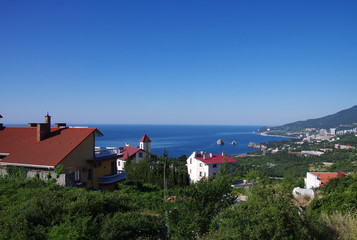 HURZUF, CRIMEA - June, 2018: View of the city and the Black sea