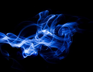 Blue smoke on black background