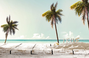 Summer background of desk and beach with palms. Free space for your decoration. 